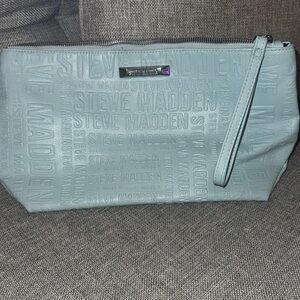 Steve Madden Light Blue Embossed Wristlet/Makeup Bag.